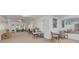 Bright office space with screened in porch, ample lighting, and several work areas at 2613 59Th S St, Gulfport, FL 33707