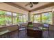 Inviting covered patio with comfortable seating and serene garden views at 2613 59Th S St, Gulfport, FL 33707