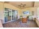 Inviting covered patio with brick flooring and comfortable seating, perfect for outdoor relaxation at 2613 59Th S St, Gulfport, FL 33707