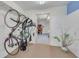 Bonus storage area featuring bikes, neutral colored paint, and access to the garage at 2613 59Th S St, Gulfport, FL 33707