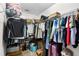 Spacious walk-in closet with ample storage space, offering organization and convenience at 28638 Tranquil Lake Cir, Wesley Chapel, FL 33543