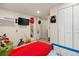 bedroom with a large closet and playful decorations at 2903 W Paxton Ave, Tampa, FL 33611