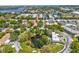 Aerial view of community featuring a pond with a fountain in the center at 3203 Green Dolphin St, Tarpon Springs, FL 34689