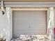 Attached single-car garage provides convenient parking and storage space at 3203 Green Dolphin St, Tarpon Springs, FL 34689