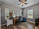 Office space featuring a computer desk, storage and a comfortable beanbag chair at 35657 Ashley Ln, Dade City, FL 33523