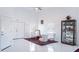 Bright living room with marble floors, white walls, and an elegant display case at 3605 W Anderson Ave, Tampa, FL 33611