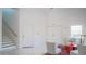 Bright living room showcasing marble floors, tall ceilings, and minimalist decor at 3605 W Anderson Ave, Tampa, FL 33611