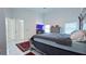 Spacious main bedroom with high ceilings, natural light, and neutral tones at 3605 W Anderson Ave, Tampa, FL 33611