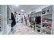 Large walk-in closet with ample shelving, storage, and clothing racks at 3605 W Anderson Ave, Tampa, FL 33611