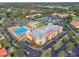 Overhead view of resort-style community, showcasing the pool, tennis courts, and lush landscaping at 4106 Queller Way, Tampa, FL 33618