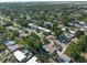 A neighborhood aerial featuring tree-lined streets, houses, and community layout at 4111 W Marietta St, Tampa, FL 33616