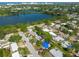 An aerial of homes, the landscape, and water feature showcases community location at 4111 W Marietta St, Tampa, FL 33616