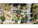 Aerial view of property showcasing the home, landscaping, and lot lines at 4801 Lynn Oaks Cir, Dover, FL 33527