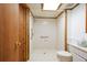 Clean bathroom with walk-in shower, grab bar, and classic fixtures at 4801 Lynn Oaks Cir, Dover, FL 33527