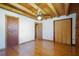 Bedroom featuring hardwood floors, a ceiling fan, and ample closet space at 4801 Lynn Oaks Cir, Dover, FL 33527