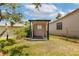 Backyard shed, located next to the main house at 4801 Lynn Oaks Cir, Dover, FL 33527