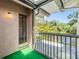 Screened balcony overlooking a lake with lush landscaping at 486 Lakeview Dr # 54, Palm Harbor, FL 34683
