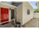 Inviting entryway featuring a bright red front door and decorative accents at 486 Lakeview Dr # 54, Palm Harbor, FL 34683