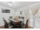View of the formal dining room with modern lighting at 5302 Aloha Seed Dr, Seffner, FL 33584