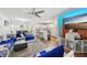 Comfortable living room showcasing the open floor plan with kitchen and dining areas at 5302 Aloha Seed Dr, Seffner, FL 33584