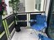 Image shows relaxing balcony with folding chairs and greenery to make you feel at home at 6190 80Th N St # 204, St Petersburg, FL 33709