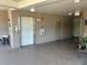Hallway with elevator, doors, and a neutral color scheme for a clean and modern look at 6190 80Th N St # 204, St Petersburg, FL 33709