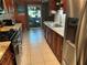 Updated kitchen featuring granite countertops, stainless steel appliances, and a breakfast nook with tile floors at 6190 80Th N St # 204, St Petersburg, FL 33709