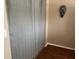 Clean window with modern gray coverings and wall art in the neutral-toned room at 6190 80Th N St # 204, St Petersburg, FL 33709