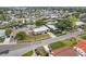 Aerial view showcasing the property's proximity to the canal and surrounding neighborhood at 8721 Bay Crest Ln, Tampa, FL 33615