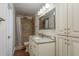 A bathroom with a tiled shower and granite vanity at 8721 Bay Crest Ln, Tampa, FL 33615