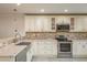 Close up of the sink, counter, and appliances in the kitchen at 8721 Bay Crest Ln, Tampa, FL 33615