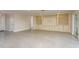 Spacious living room with lots of natural light, built-in shelving, and a front entrance at 8721 Bay Crest Ln, Tampa, FL 33615
