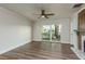 An open living room with sliding glass doors to the outdoor area at 8721 Bay Crest Ln, Tampa, FL 33615