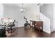 Bright office space with wood floors, modern chandelier and peloton at 9534 W Park Village Dr, Tampa, FL 33626