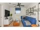 Comfortable living room featuring stylish furniture, decor, and natural light, creating a modern, relaxing space at 9971 Trellis Vine Way, Parrish, FL 34219