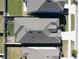 Aerial view of a home featuring a well-maintained roof with solar panels at 10303 Malvasia Ave, Riverview, FL 33578