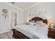Bright bedroom with a large bed, and en-suite bathroom at 10303 Malvasia Ave, Riverview, FL 33578