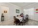 Elegant dining room features decorative lighting, and natural light at 10303 Malvasia Ave, Riverview, FL 33578