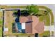 Aerial view of home with a pool, shed, and privacy fence at 10833 96Th N St, Largo, FL 33773