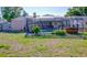 The backyard showcases a private pool and spa, perfect for outdoor enjoyment at 10833 96Th N St, Largo, FL 33773