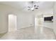 Open concept living room with vaulted ceiling and bright open space at 11506 Mansfield Point Dr, Riverview, FL 33569