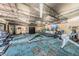 Community gym featuring weight machines, treadmills, and exercise equipment on a blue patterned carpet at 11800 Ivywood Pl, New Port Richey, FL 34654