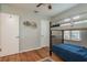 Bedroom with bunkbeds, hard wood flooring, and a bright window at 1253 Union St, Clearwater, FL 33755