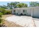 Charming single-story home with a well-maintained front yard featuring minimalist rock at 1253 Union St, Clearwater, FL 33755