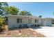 Charming single-story home with a well-maintained front yard featuring minimalist rock at 1253 Union St, Clearwater, FL 33755