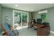 A modern office with sliding glass doors leading to a backyard at 1253 Union St, Clearwater, FL 33755