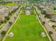 Community park featuring a gazebo, swimming pool, playground, and landscaped areas at 12775 Maple Bonsai Dr, Riverview, FL 33579