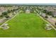 Expansive green space with a gazebo and seating areas in a residential community at 12775 Maple Bonsai Dr, Riverview, FL 33579