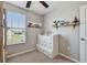 Bedroom with a built in dresser, shelf and window at 12775 Maple Bonsai Dr, Riverview, FL 33579