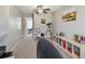 Versatile bonus room with carpet flooring, natural light, and potential for various uses at 12775 Maple Bonsai Dr, Riverview, FL 33579